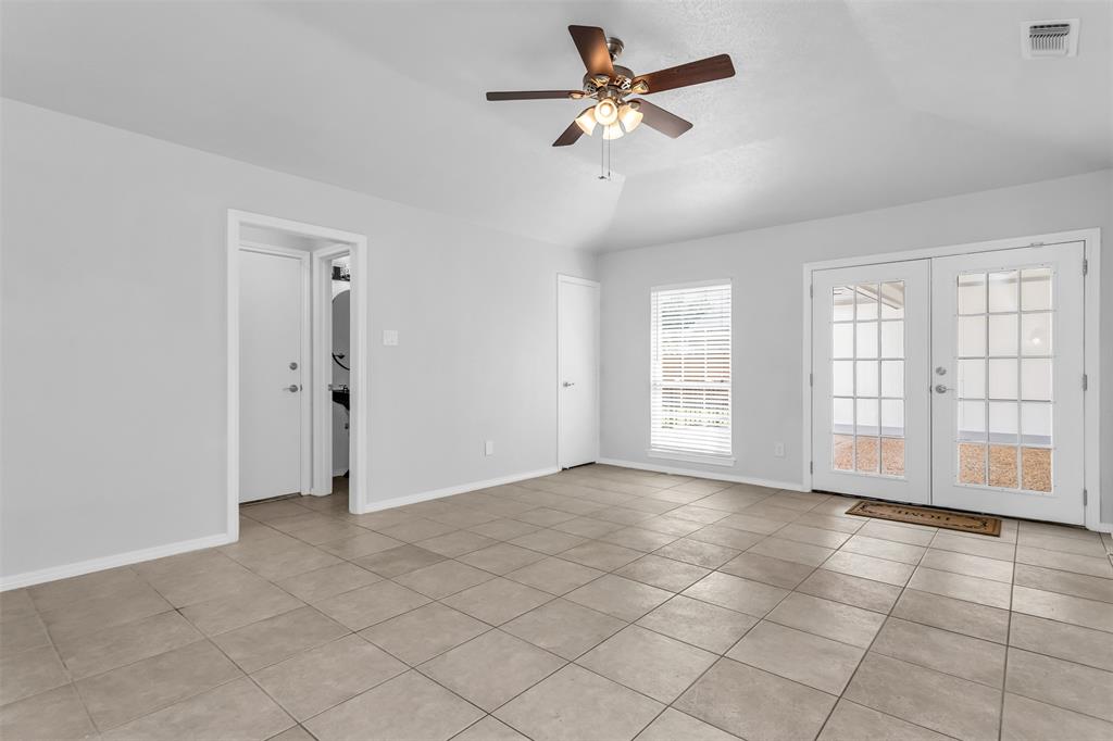7233 Rustic Valley Drive Dallas, TX 75248 - Photo 13 of 21 a view of an empty room with a window