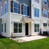 a view of a building with a yard