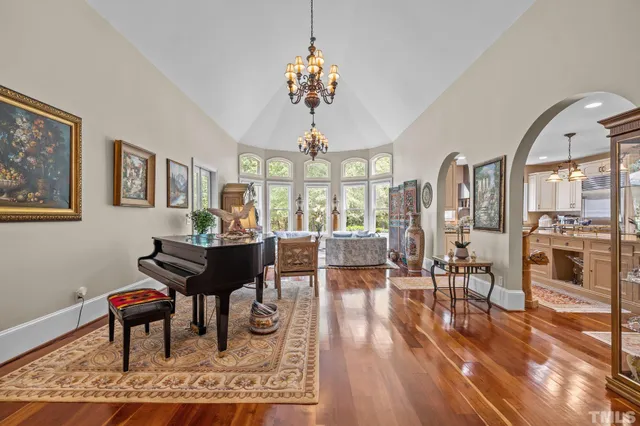 a kitchen with stainless steel appliances a stove a sink and a refrigerator