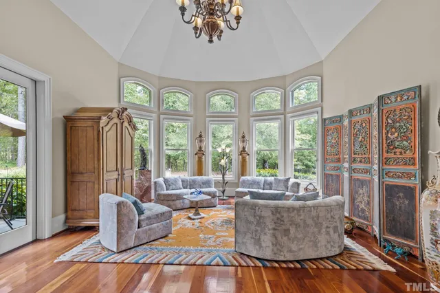 a large kitchen with stainless steel appliances granite countertop a stove and a center island