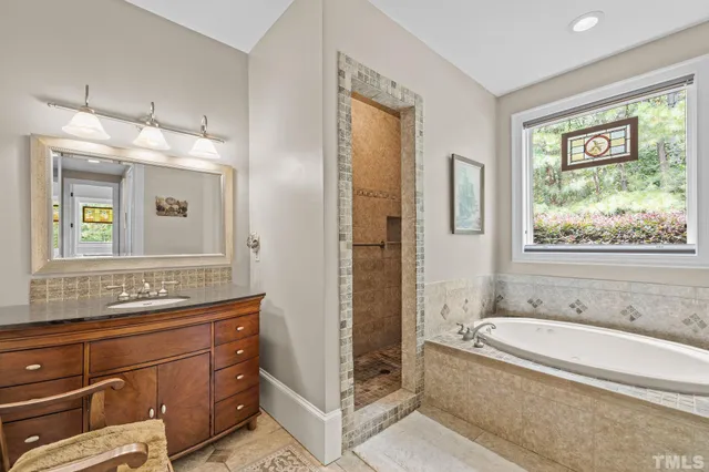 a bedroom with bed and window