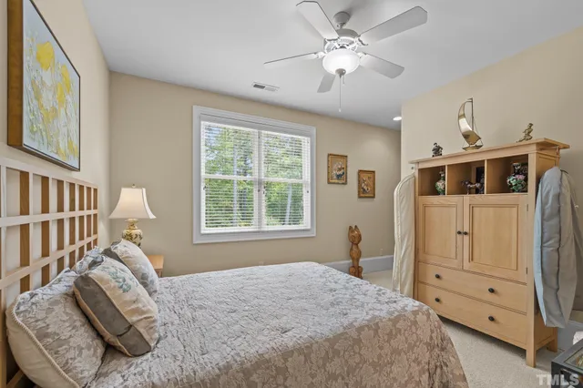 a view of a large yard with lots of green space