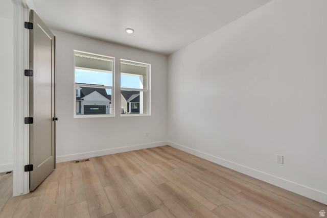 1302 1475 East, Unit 40 Payson, UT 84651 - Photo 6 of 34 Unfurnished room featuring baseboards and light wood-style flooring