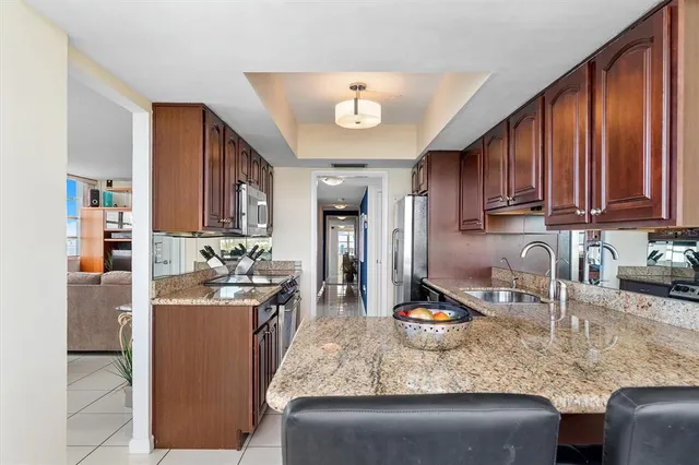 a living room with fireplace furniture and a window