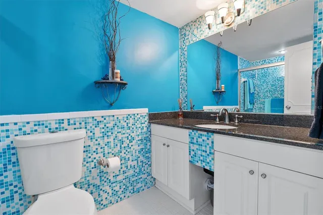 a view of a bedroom and a window