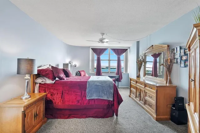 a view of a swimming pool and a chair