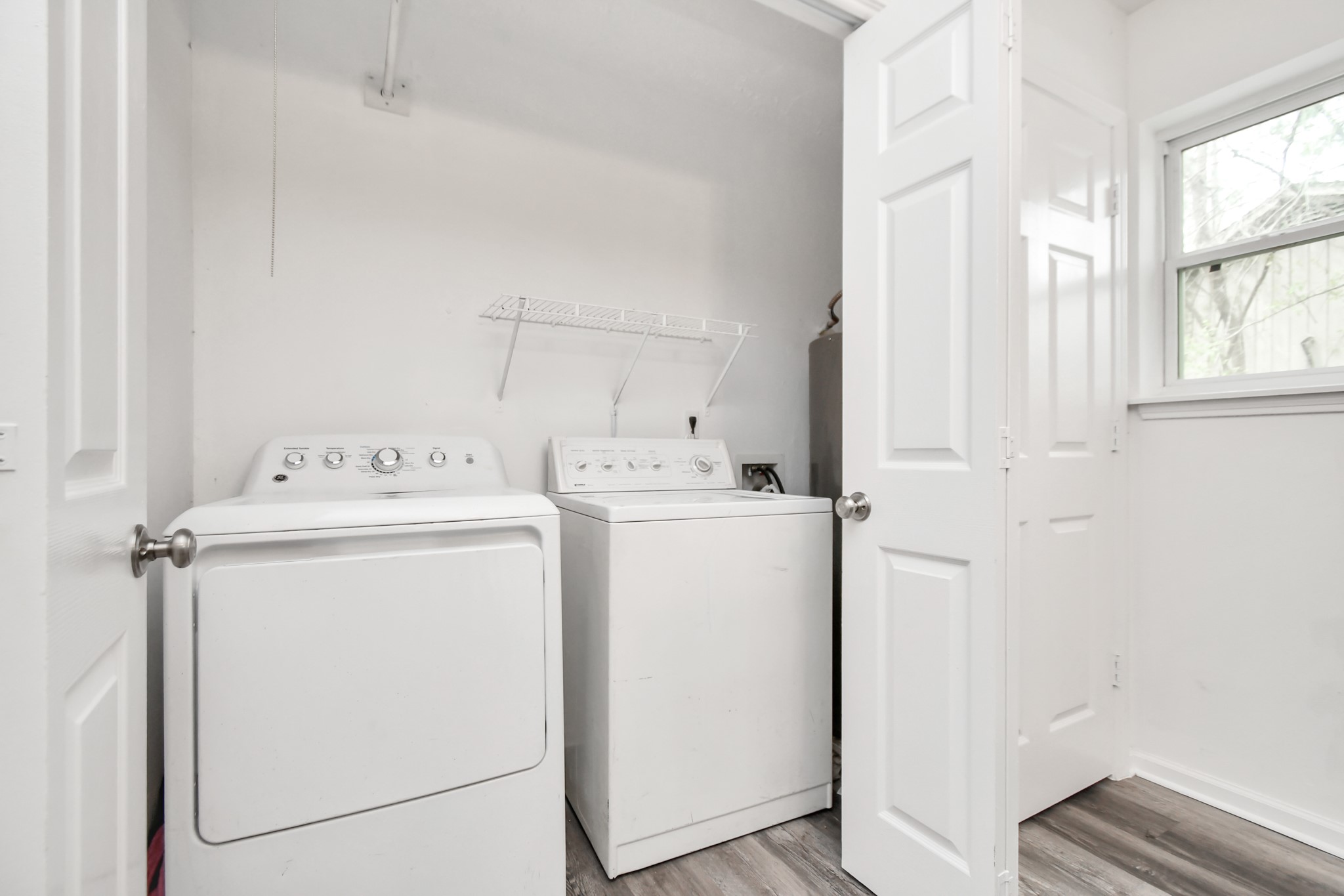 22723 Earlmist Drive Spring, TX 77373 - Photo 15 of 20 a utility room with dryer and washer