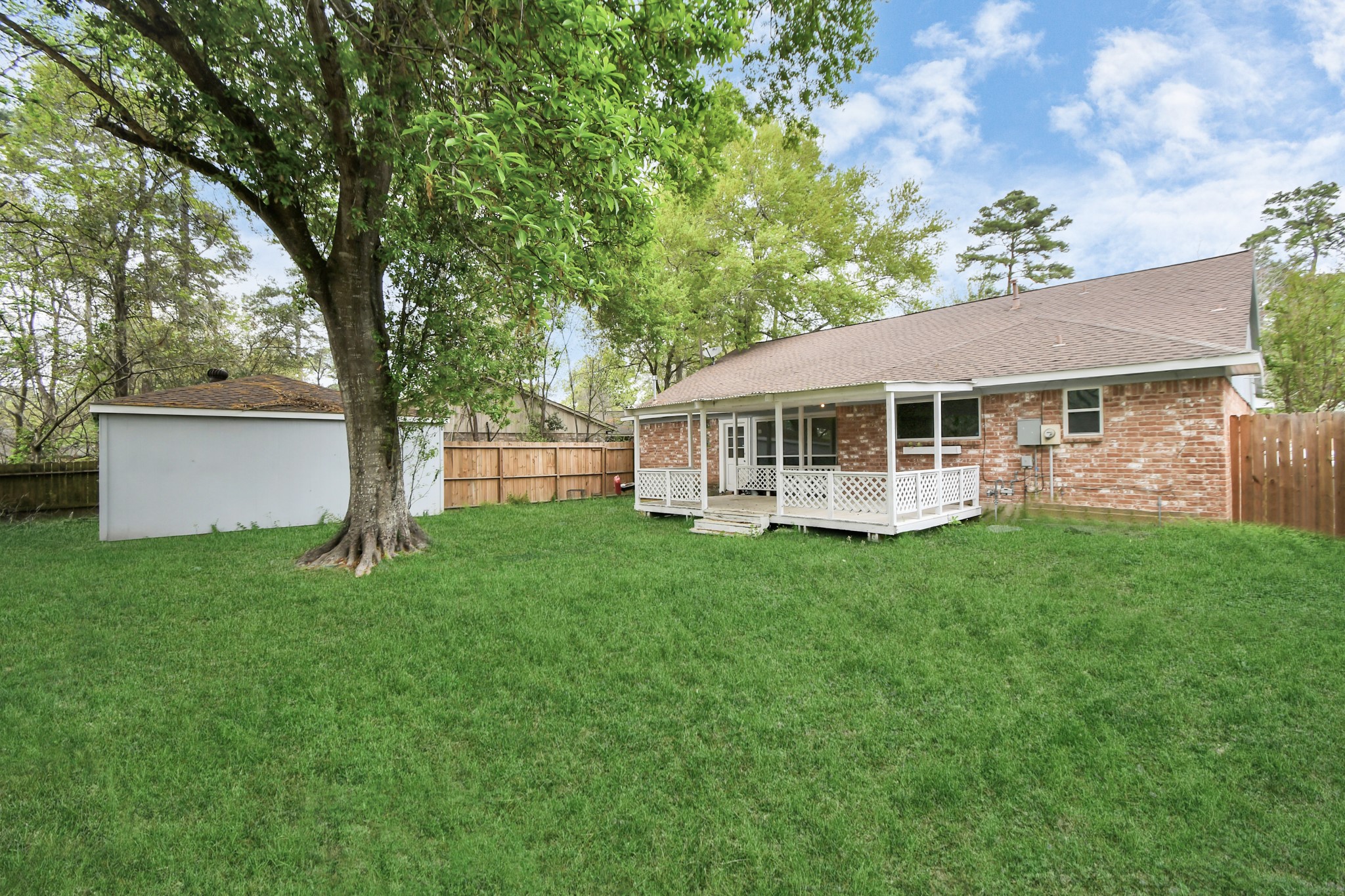 22723 Earlmist Drive Spring, TX 77373 - Photo 19 of 20 a view of a house with a backyard