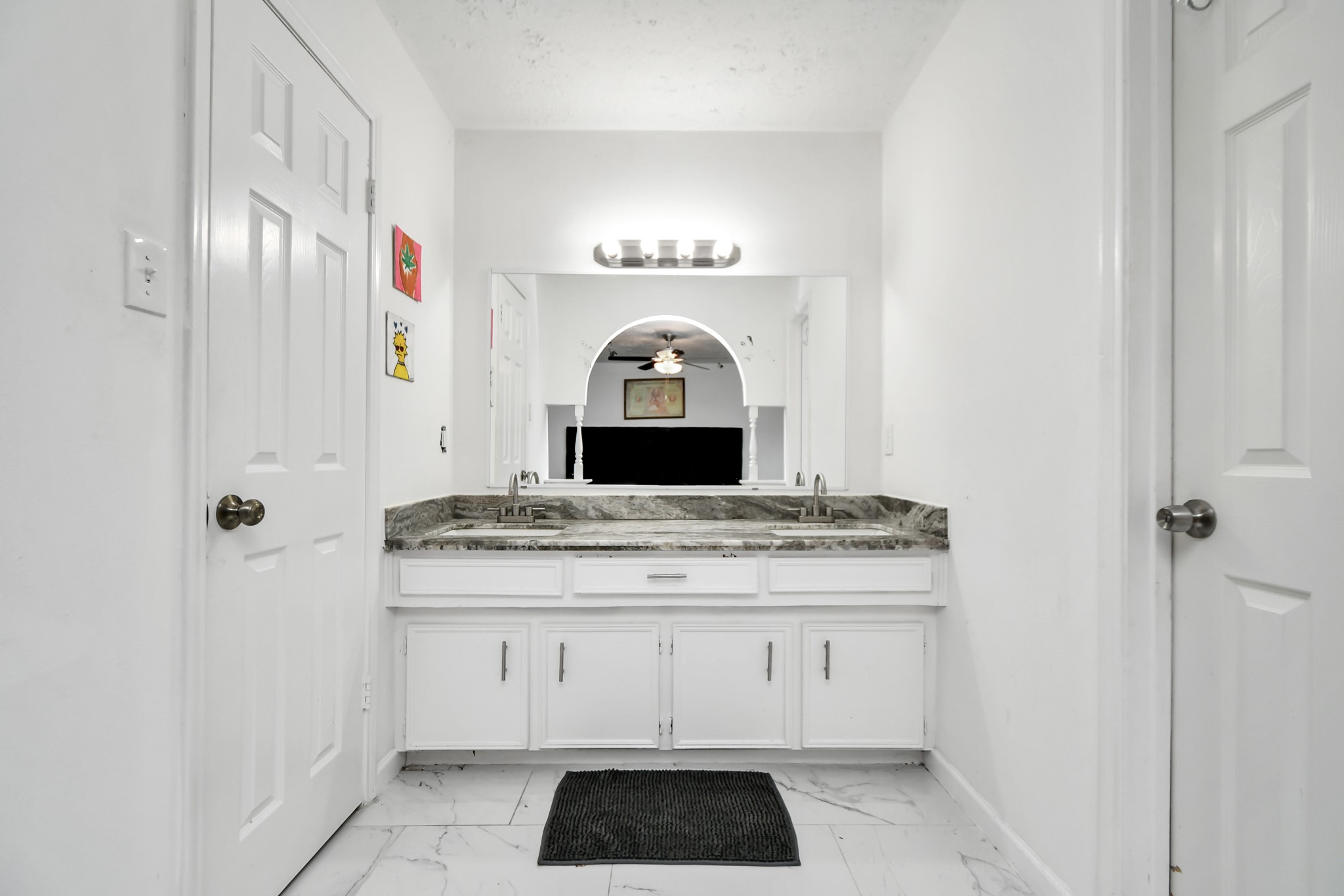 22723 Earlmist Drive Spring, TX 77373 - Photo 10 of 20 a view of granite countertop white cabinets and a wooden floor
