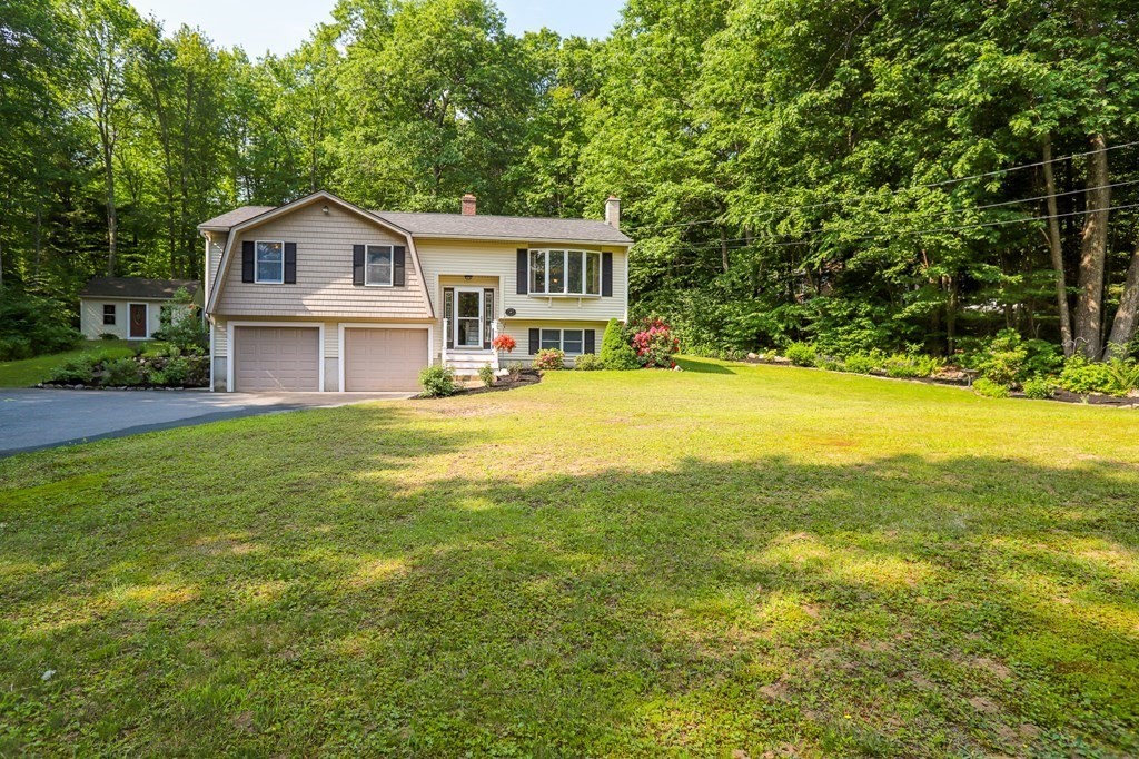 120 Brooks Village Road Templeton, MA 01468 - Photo 3 of 40 a house view with a garden space