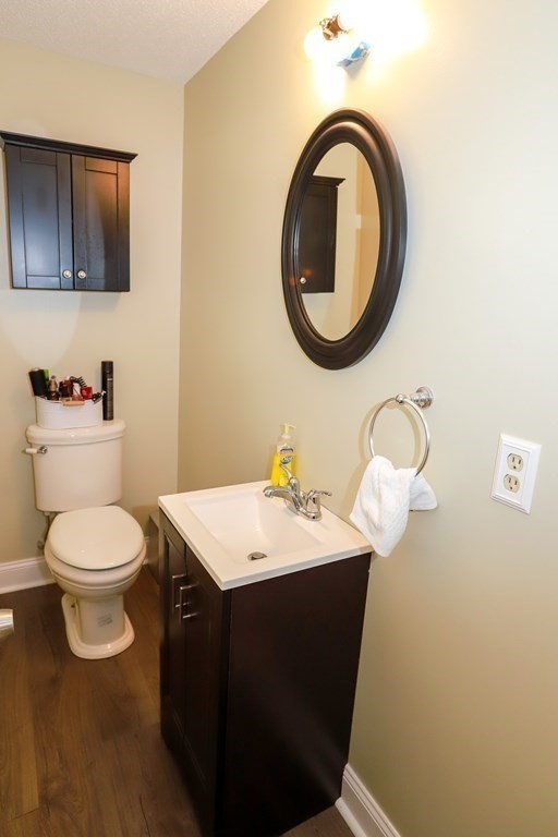 120 Brooks Village Road Templeton, MA 01468 - Photo 31 of 40 a bathroom with a sink a toilet and a mirror