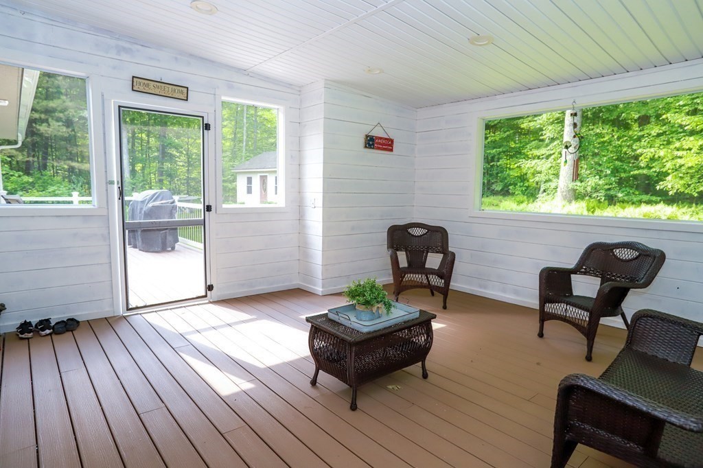 120 Brooks Village Road Templeton, MA 01468 - Photo 40 of 40 a living room with furniture and a wooden floor