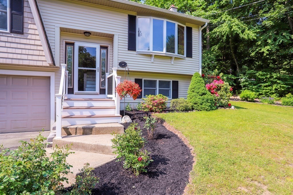 120 Brooks Village Road Templeton, MA 01468 - Photo 5 of 40 a front view of a house with swimming pool and porch