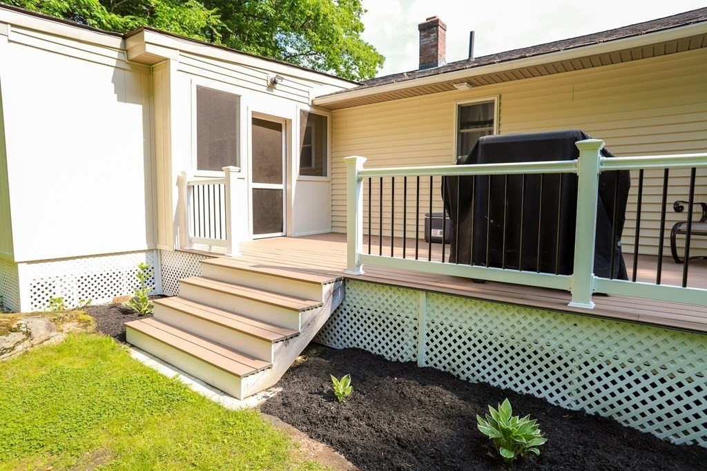 120 Brooks Village Road Templeton, MA 01468 - Photo 8 of 40 a view of a house with a wooden fence
