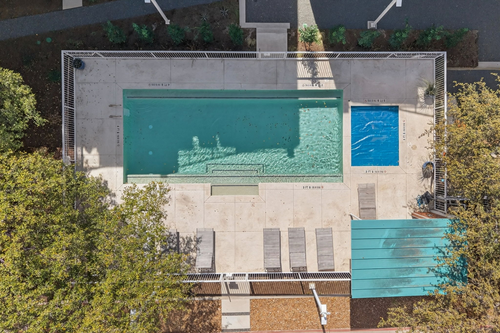 2301 South 5th Street, Unit 25 Austin, TX 78704 - Photo 33 of 35 Bird's eye view of a pool area