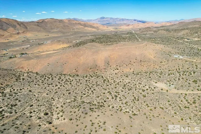 a view of ocean and mountain