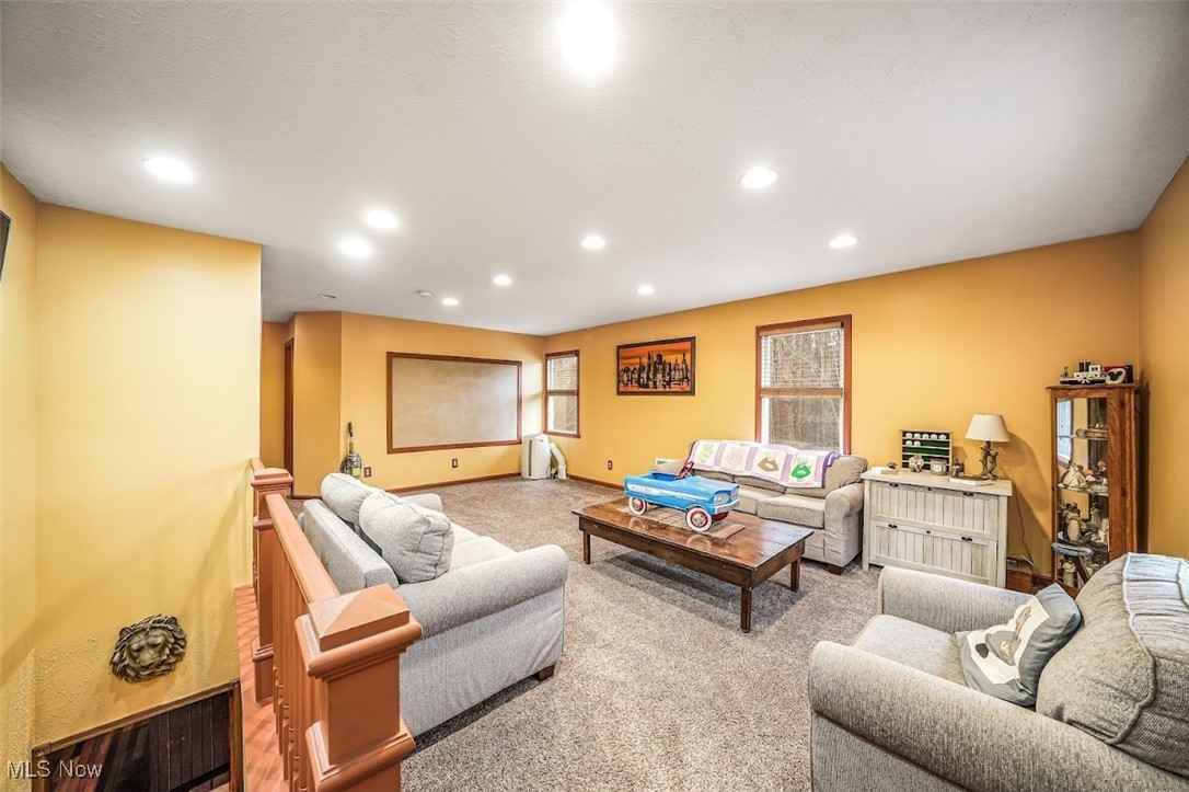 17808 Nash Road Middlefield, OH 44062 - Photo 27 of 43 Living area featuring carpet and recessed lighting