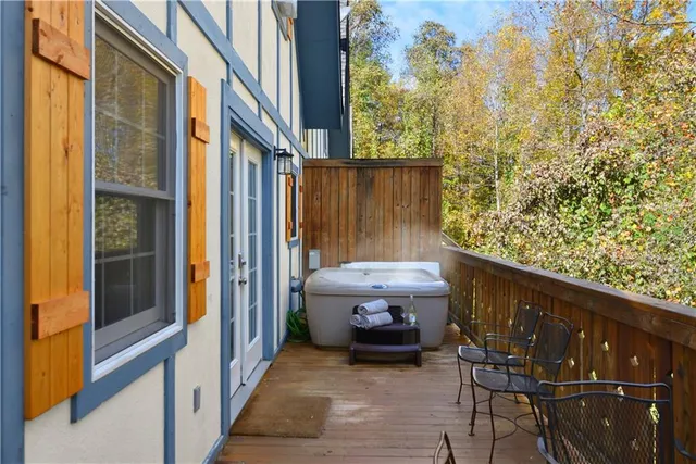 a view of balcony with furniture