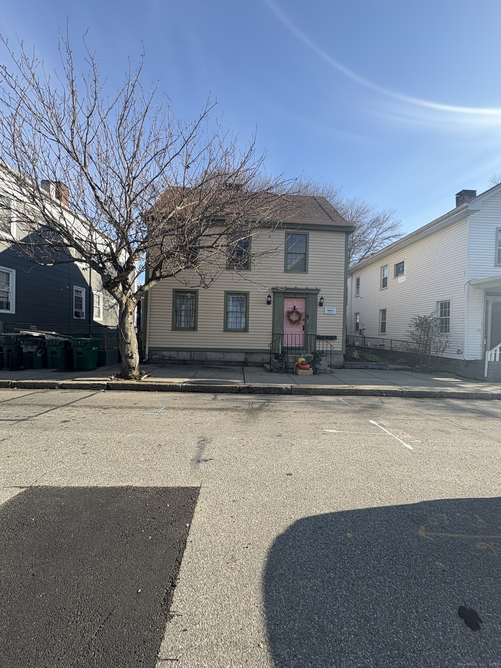 a view of a house with a snow in the yard