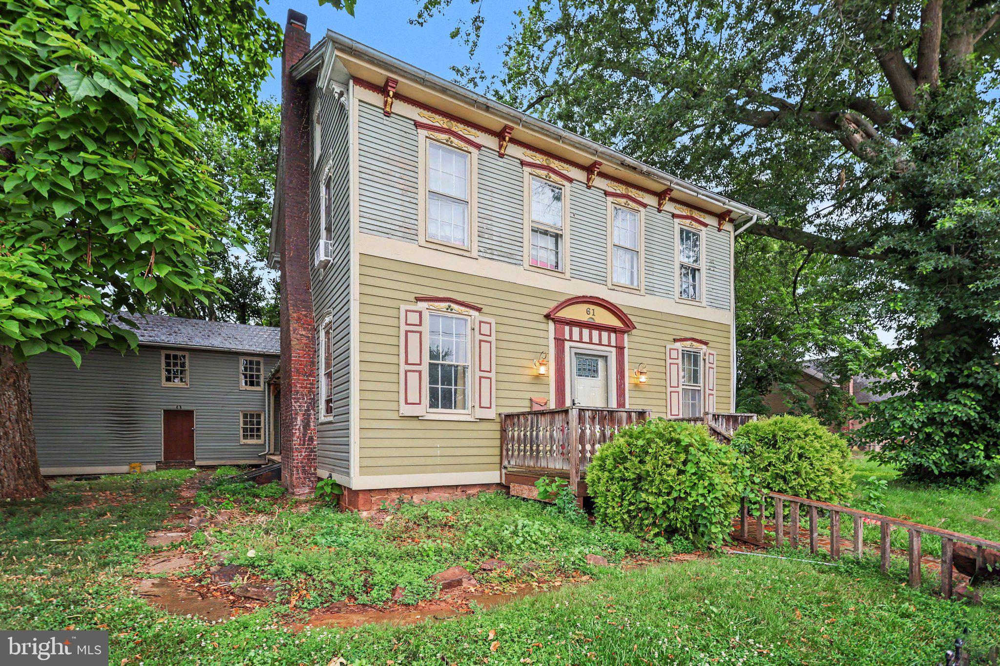 61 Mayfield Street Dover, PA 17315 - Photo 3 of 26 Charming vintage home with lush greenery.
