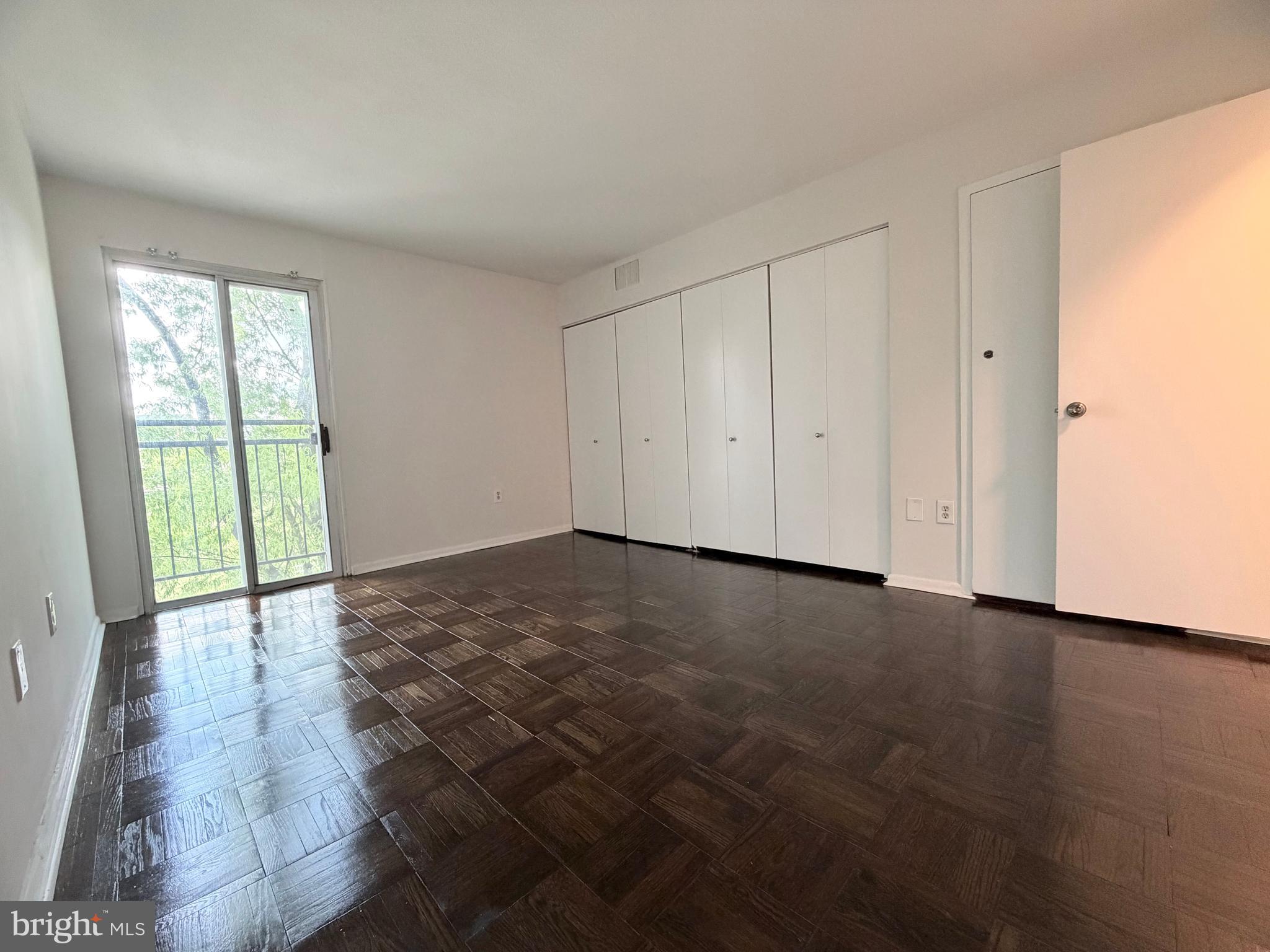 700 7th Street Southwest, Unit 406 Washington, DC 20024 - Photo 25 of 50 a view of an empty room with glass door