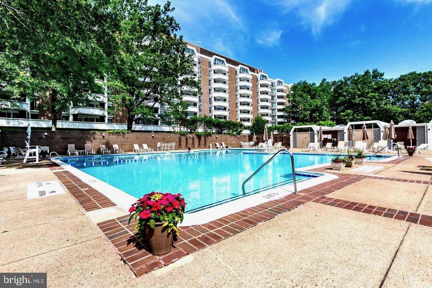 700 7th Street Southwest, Unit 406 Washington, DC 20024 - Photo 37 of 50 a view of a swimming pool with a patio