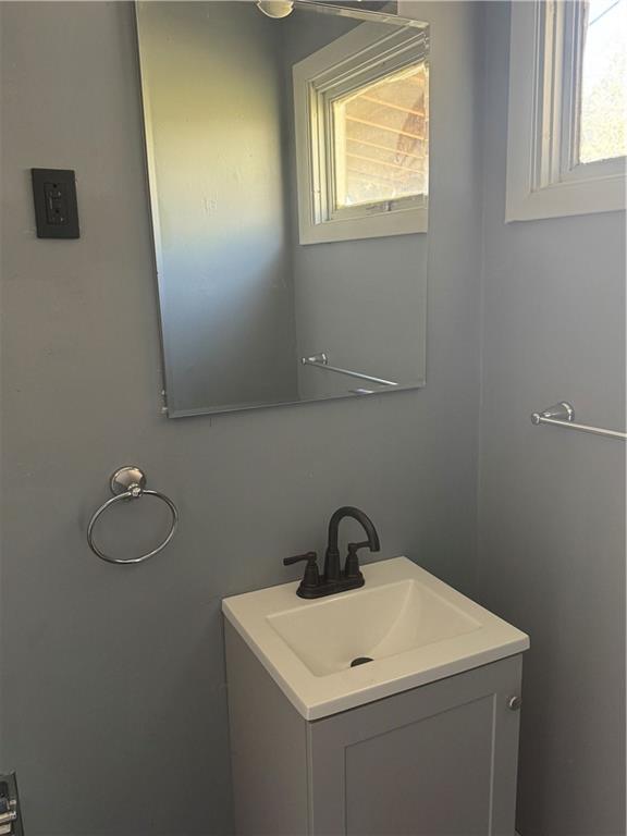 546 Ridge Avenue New Kensington, PA 15068 - Photo 8 of 14 a close up of a sink a window and a mirror