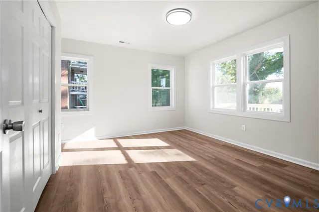 a view of an empty room and window