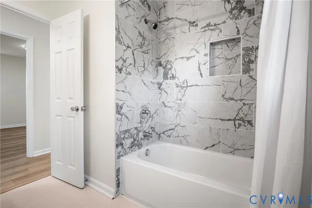 a bathroom with a bathtub