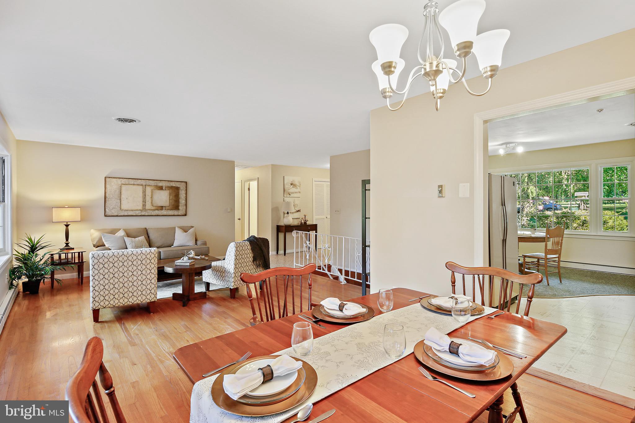 10033 Fox Den Road Ellicott City, MD 21042 - Photo 7 of 39 Open living and dining room.