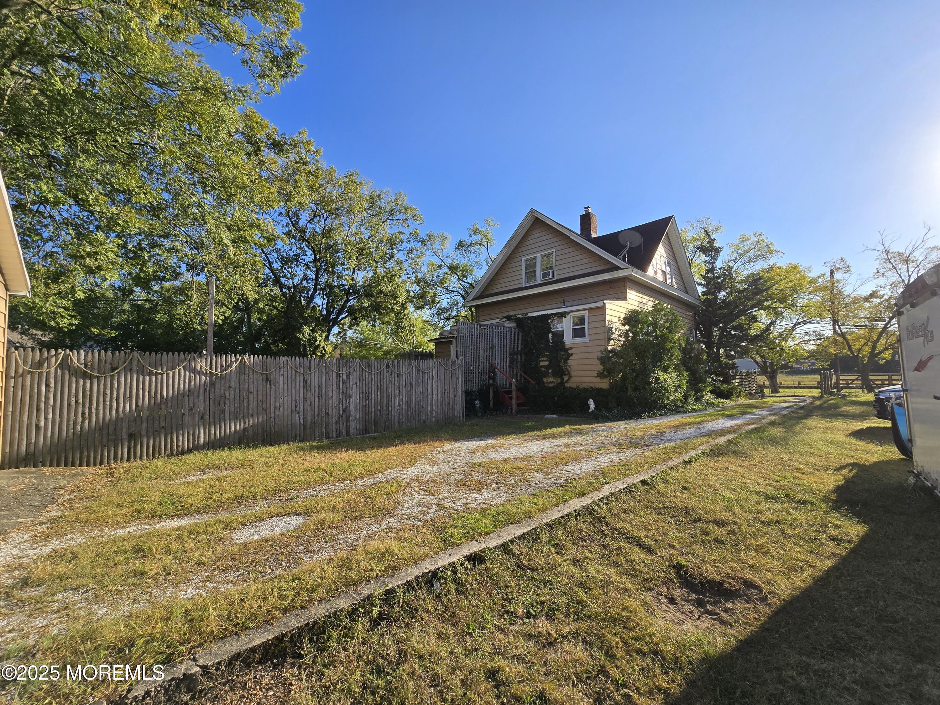 112 Creek Road Keansburg, NJ 07734 - Photo 8 of 9 a view of a house with a yard