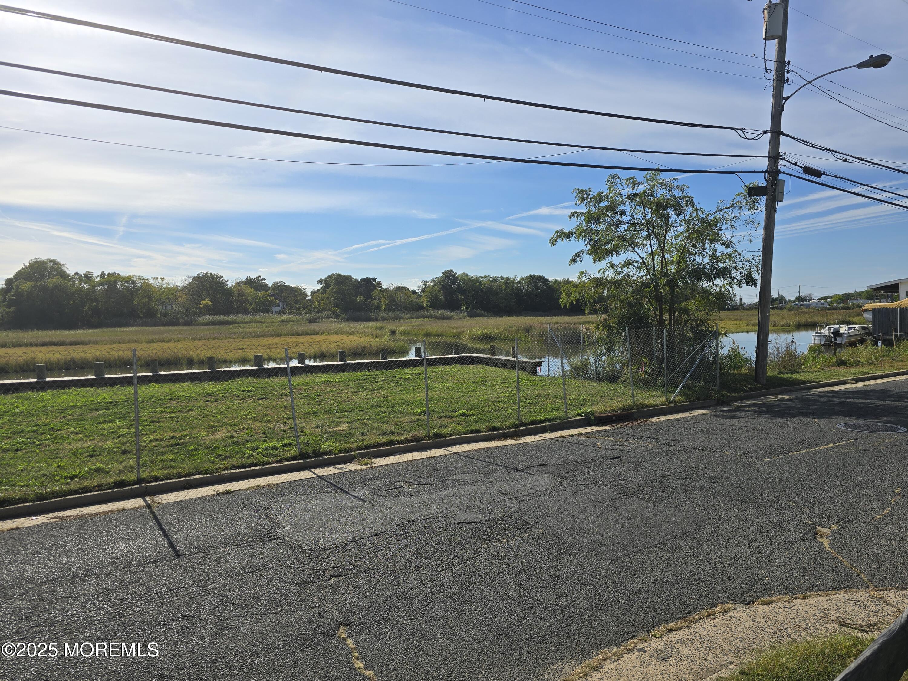 112 Creek Road Keansburg, NJ 07734 - Photo 9 of 9 a view of a lake with a big yard