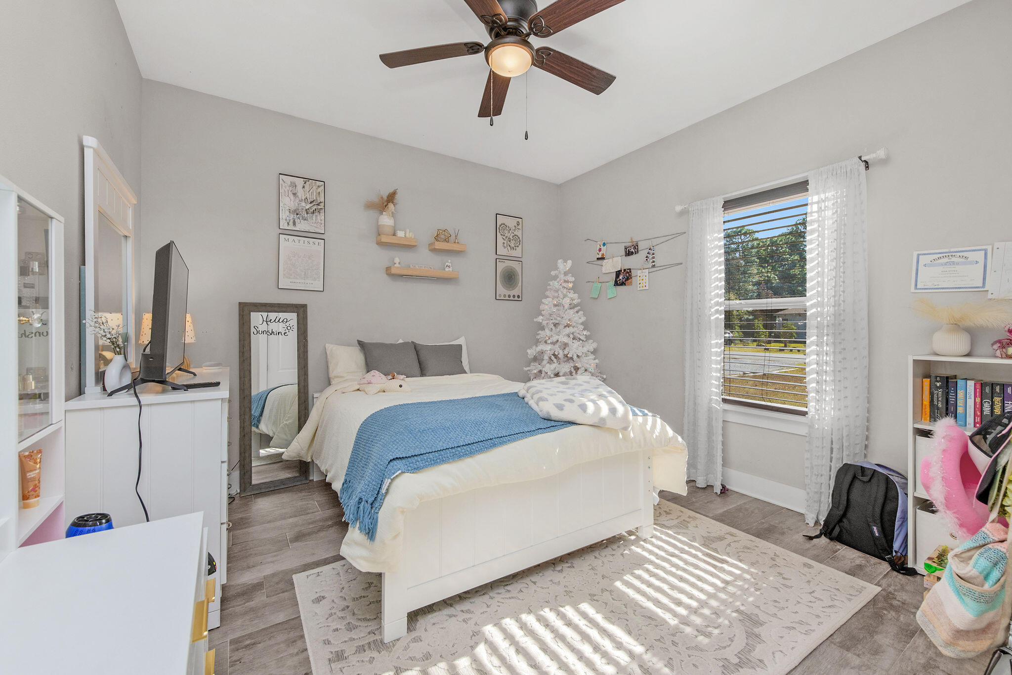 8914 Timber Lane Navarre, FL 32566 - Photo 30 of 40 a bedroom with a bed and wooden floor