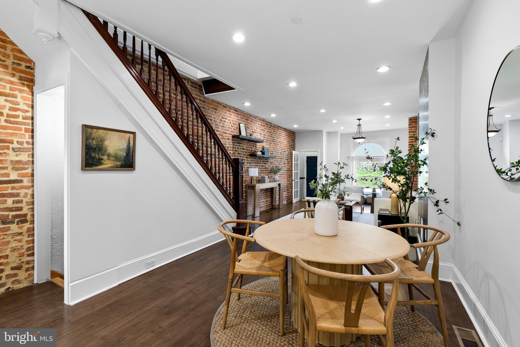2529 Eastern Avenue Baltimore, MD 21224 - Photo 12 of 50 a view of a dining room with furniture and wooden floor