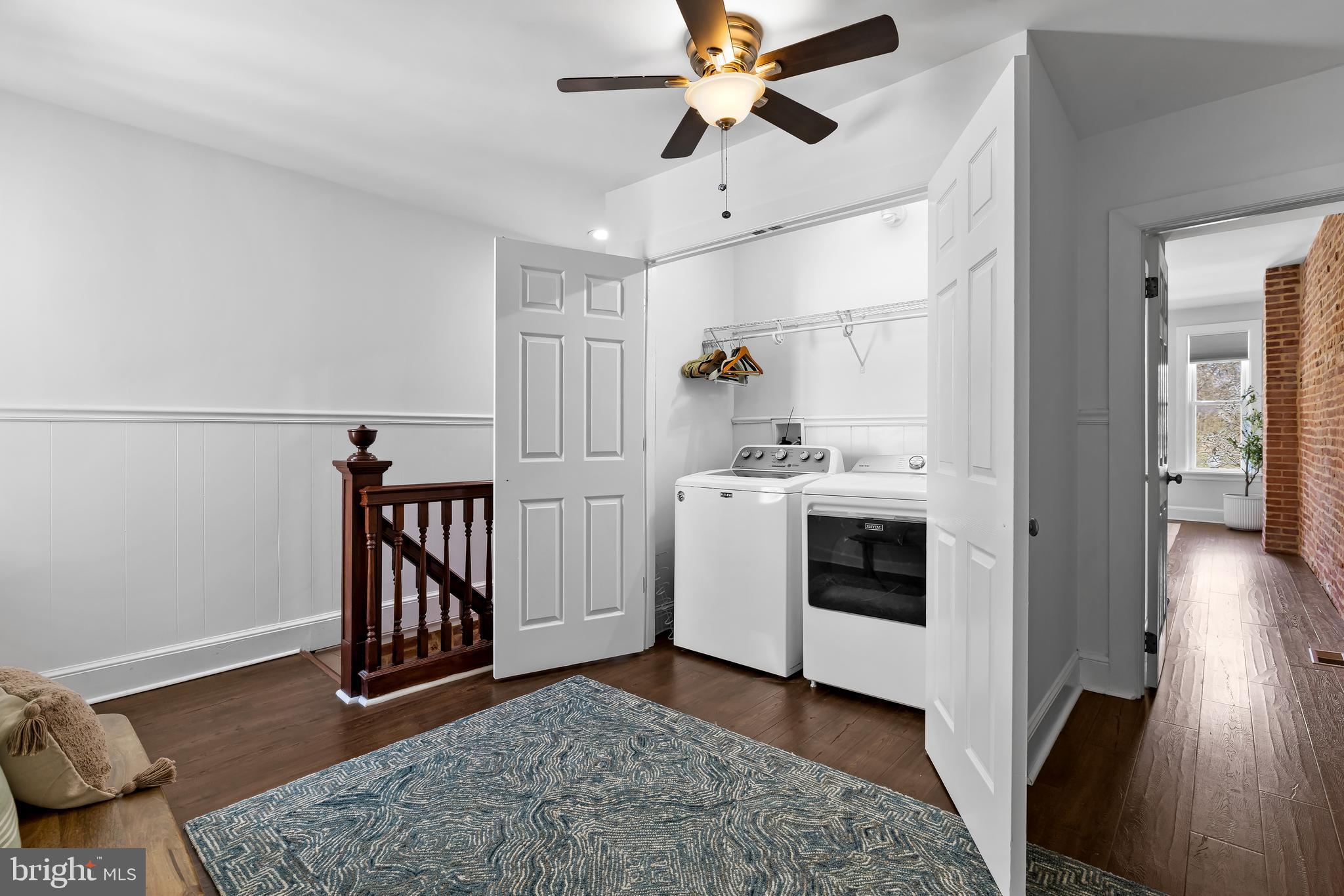 2529 Eastern Avenue Baltimore, MD 21224 - Photo 20 of 50 a view of hallway with wooden floor and chandelier
