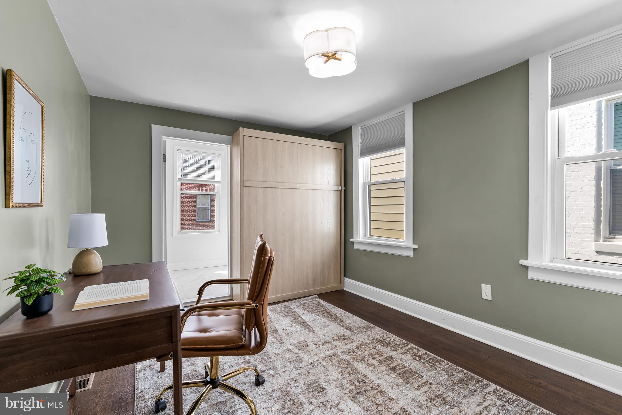 2529 Eastern Avenue Baltimore, MD 21224 - Photo 27 of 50 a workspace with furniture and window