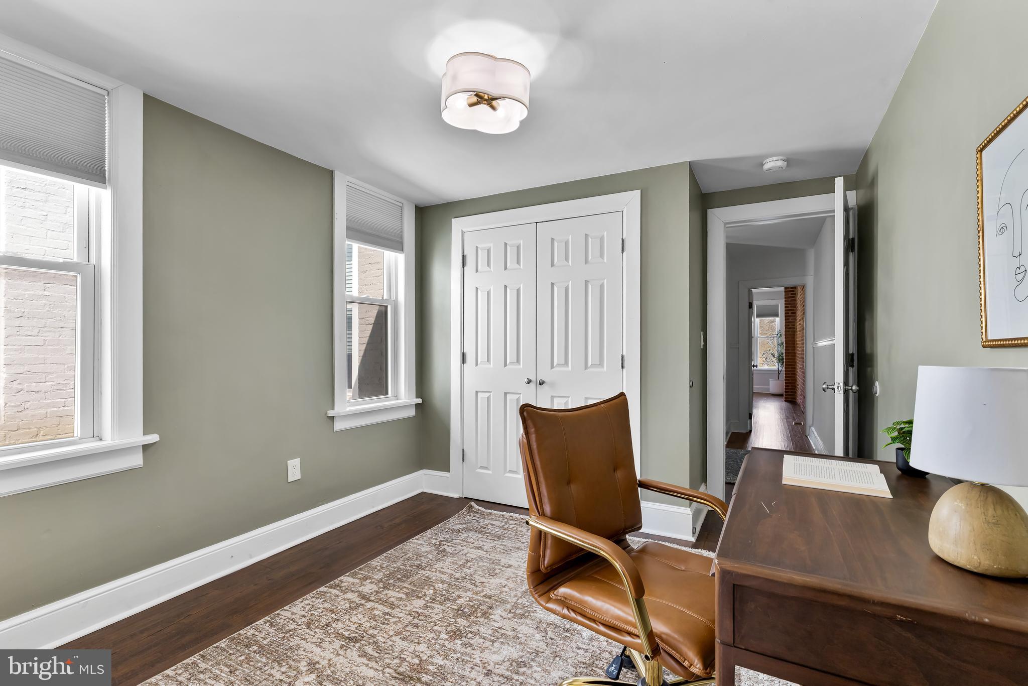 2529 Eastern Avenue Baltimore, MD 21224 - Photo 28 of 50 a workspace room with furniture and wooden floor
