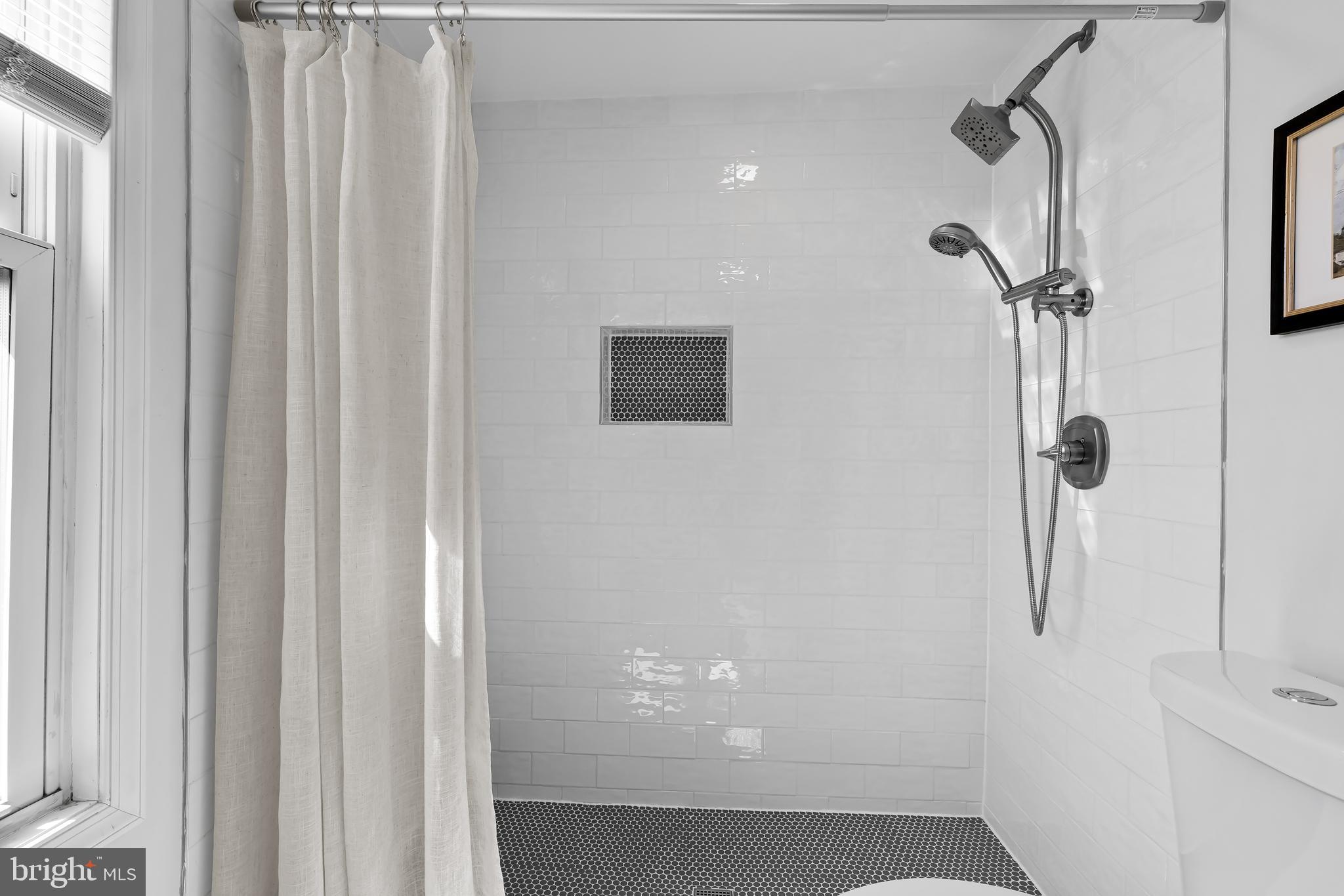 2529 Eastern Avenue Baltimore, MD 21224 - Photo 30 of 50 a bathroom with a shower