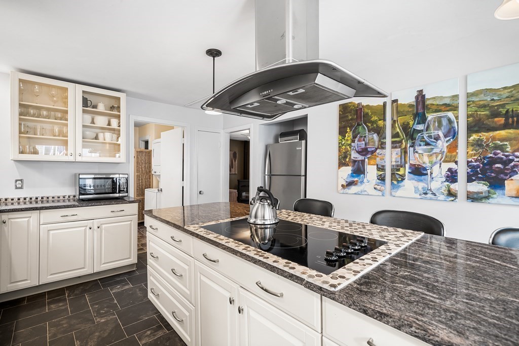 9 Tucker Lane Sutton, MA 01590 - Photo 12 of 33 a kitchen that has a sink and cabinets