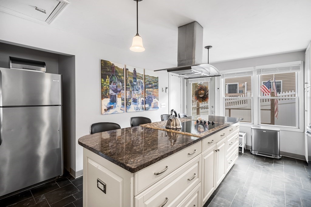 9 Tucker Lane Sutton, MA 01590 - Photo 13 of 33 a kitchen with stainless steel appliances granite countertop a sink a refrigerator and a stove