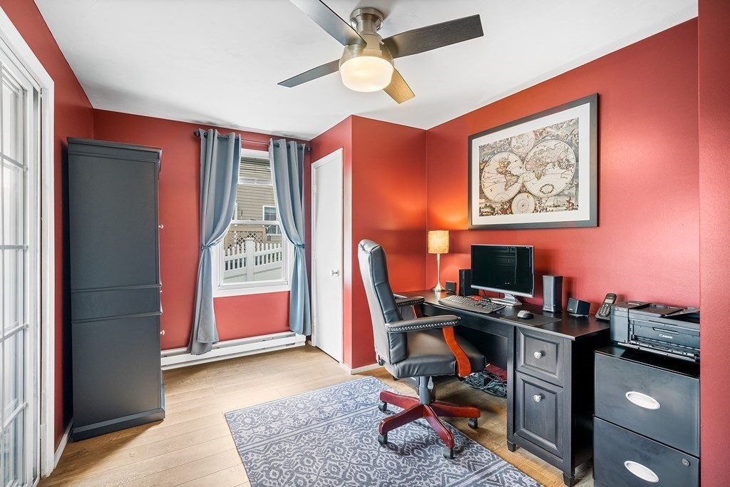 9 Tucker Lane Sutton, MA 01590 - Photo 20 of 33 a view of a workspace with furniture and a window