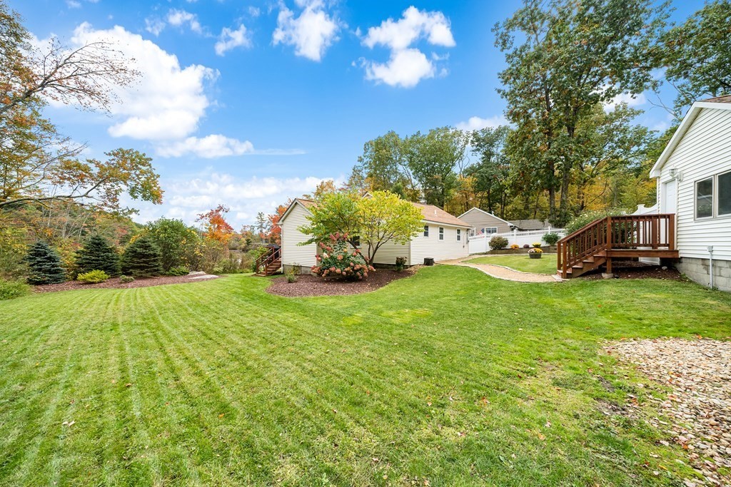 9 Tucker Lane Sutton, MA 01590 - Photo 26 of 33 a front view of a house with garden