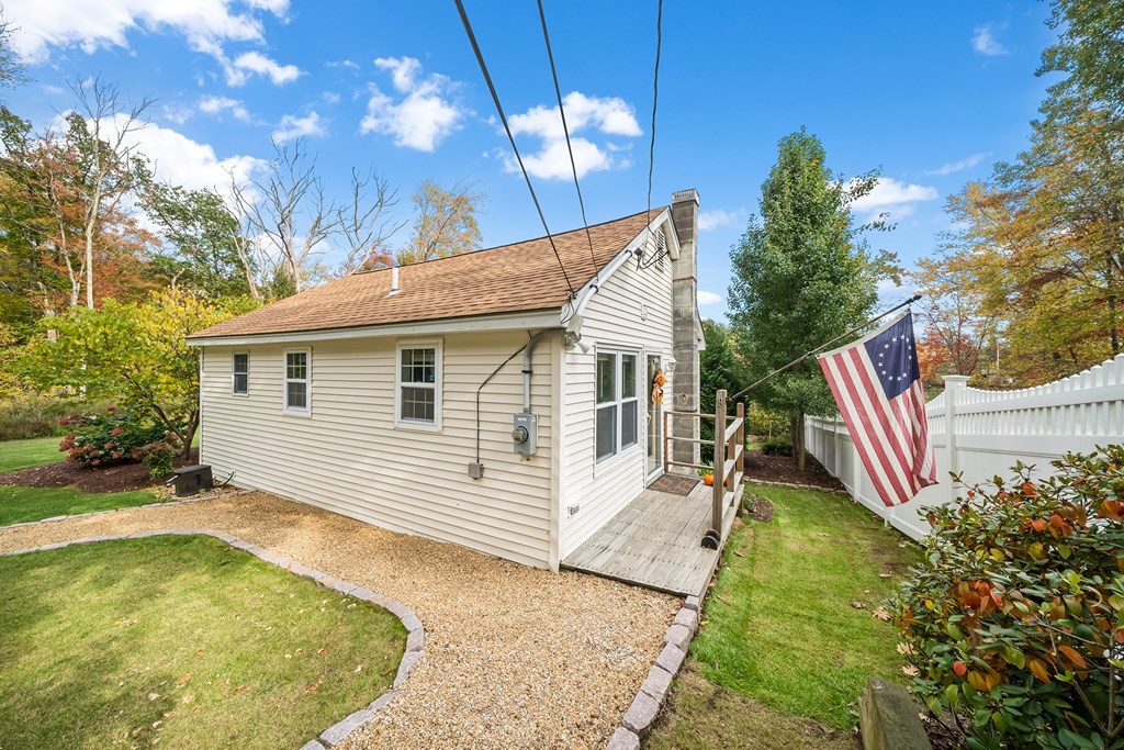 9 Tucker Lane Sutton, MA 01590 - Photo 30 of 33 a view of a house with a backyard
