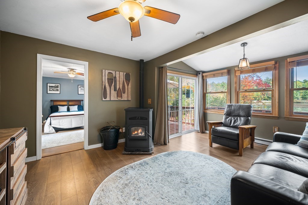 9 Tucker Lane Sutton, MA 01590 - Photo 6 of 33 a living room with furniture and a large window