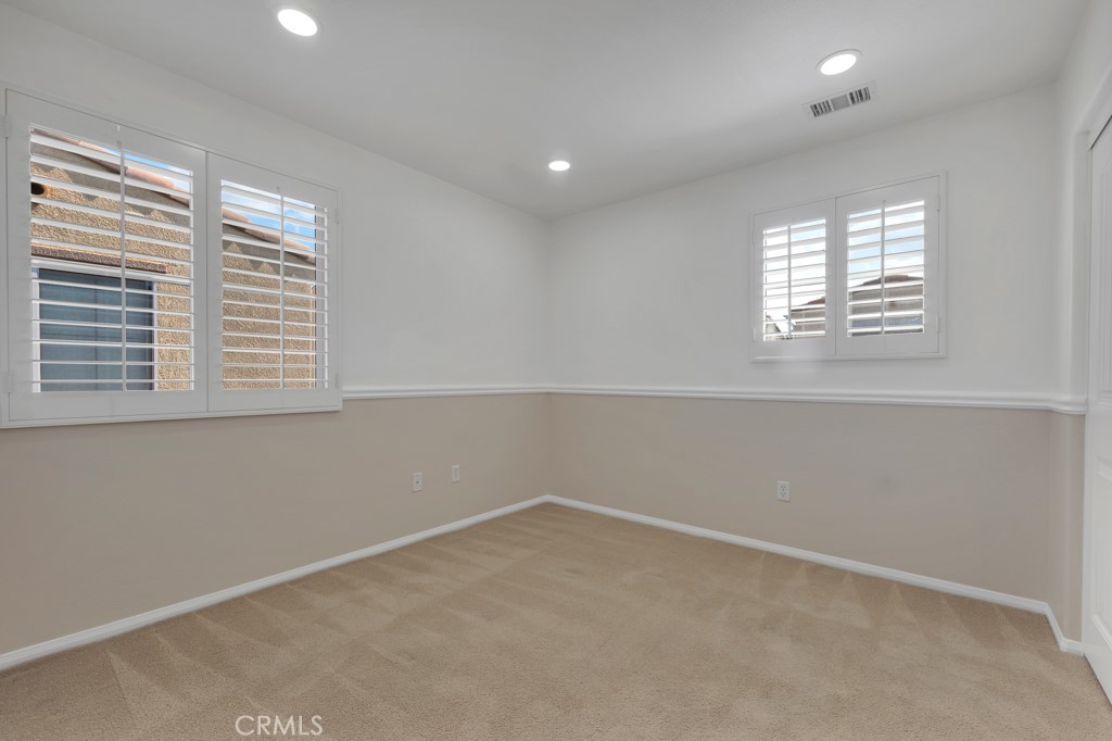 11522 Cararra Lane Porter Ranch, CA 91326 - Photo 14 of 32 an empty room with a window