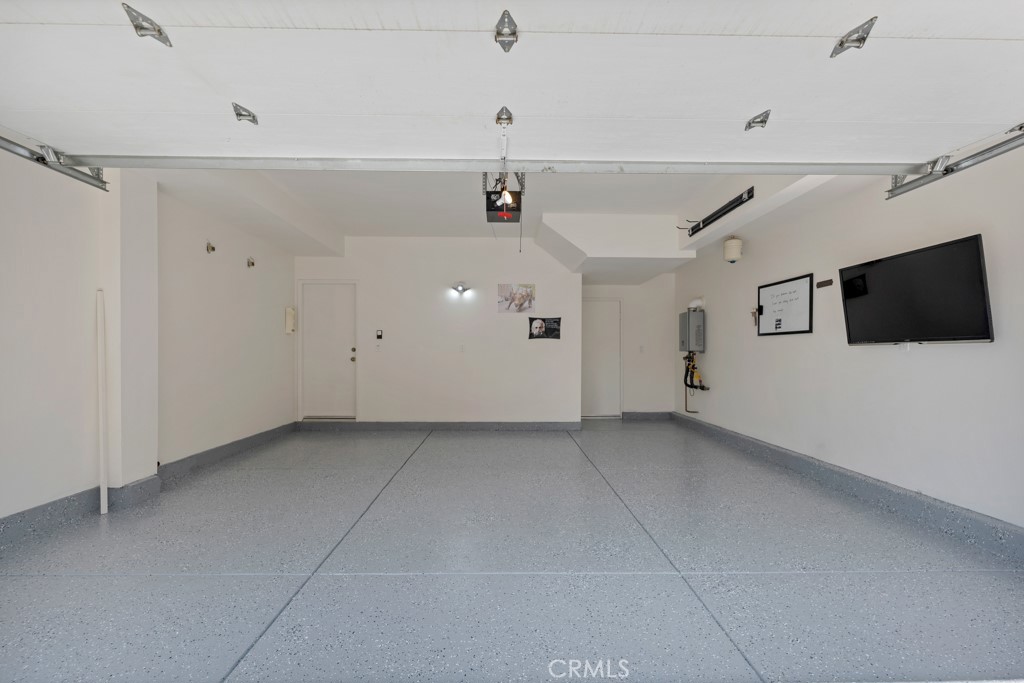 11522 Cararra Lane Porter Ranch, CA 91326 - Photo 22 of 32 a view of a livingroom with an empty space