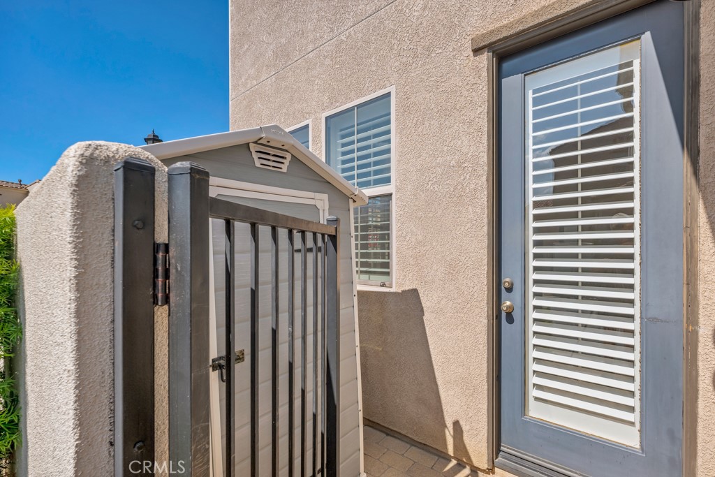 11522 Cararra Lane Porter Ranch, CA 91326 - Photo 26 of 32 a front view of a house with stairs
