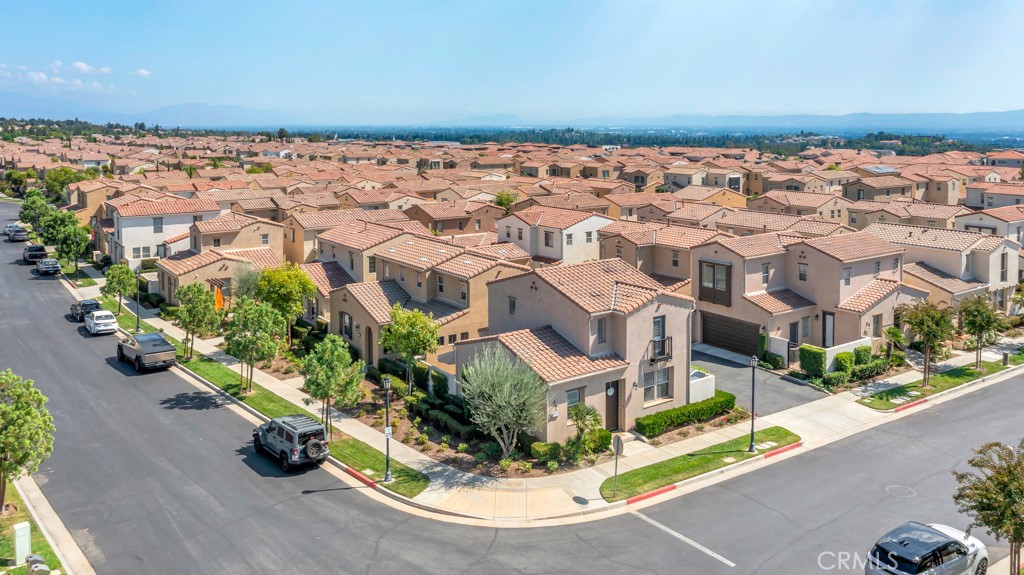11522 Cararra Lane Porter Ranch, CA 91326 - Photo 29 of 32 an aerial view of a house with a yard and lake view