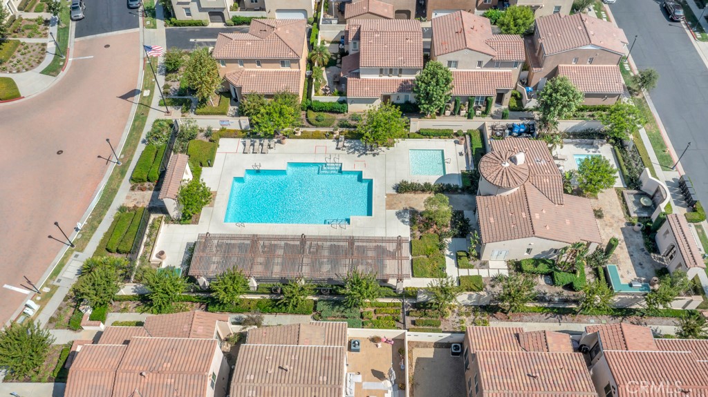 11522 Cararra Lane Porter Ranch, CA 91326 - Photo 31 of 32 an aerial view of multiple houses with yard