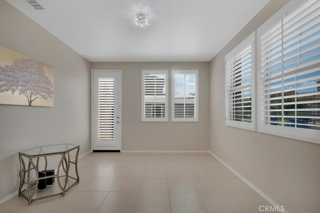 11522 Cararra Lane Porter Ranch, CA 91326 - Photo 6 of 32 a view of an empty room with a window